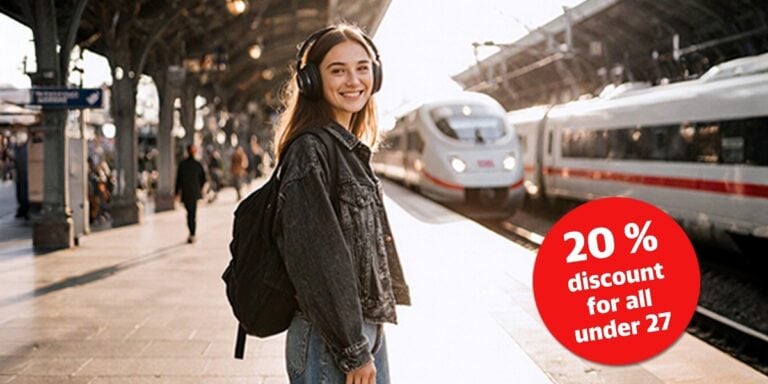 Young traveller on a Deutsche Bahn train using the Deutschlandticket